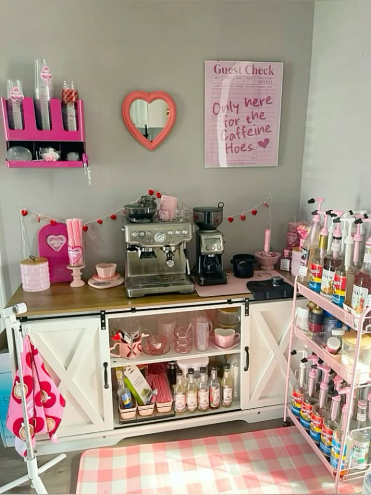 Cozy pink coffee corner with espresso machines, syrup bottles, and cute decor, perfect for caffeine lovers.