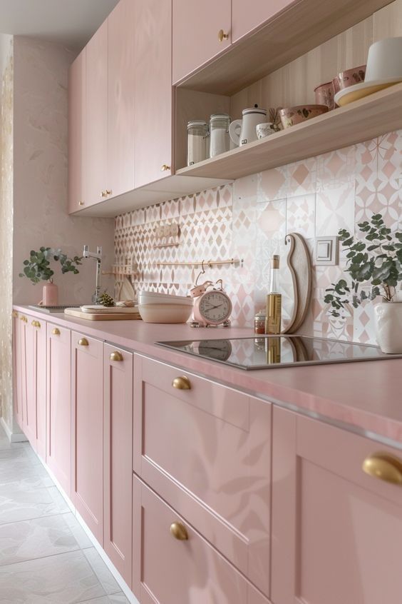 Chic pink kitchen with patterned backsplash and modern decor. Features sleek cabinetry and stylish accessories. Cozy and elegant.