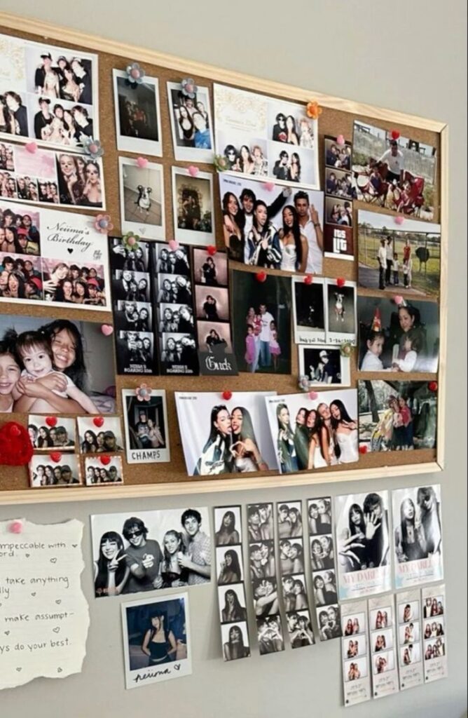 Bulletin board filled with nostalgic photos and memories pinned with colorful tacks, showcasing friends and family moments.