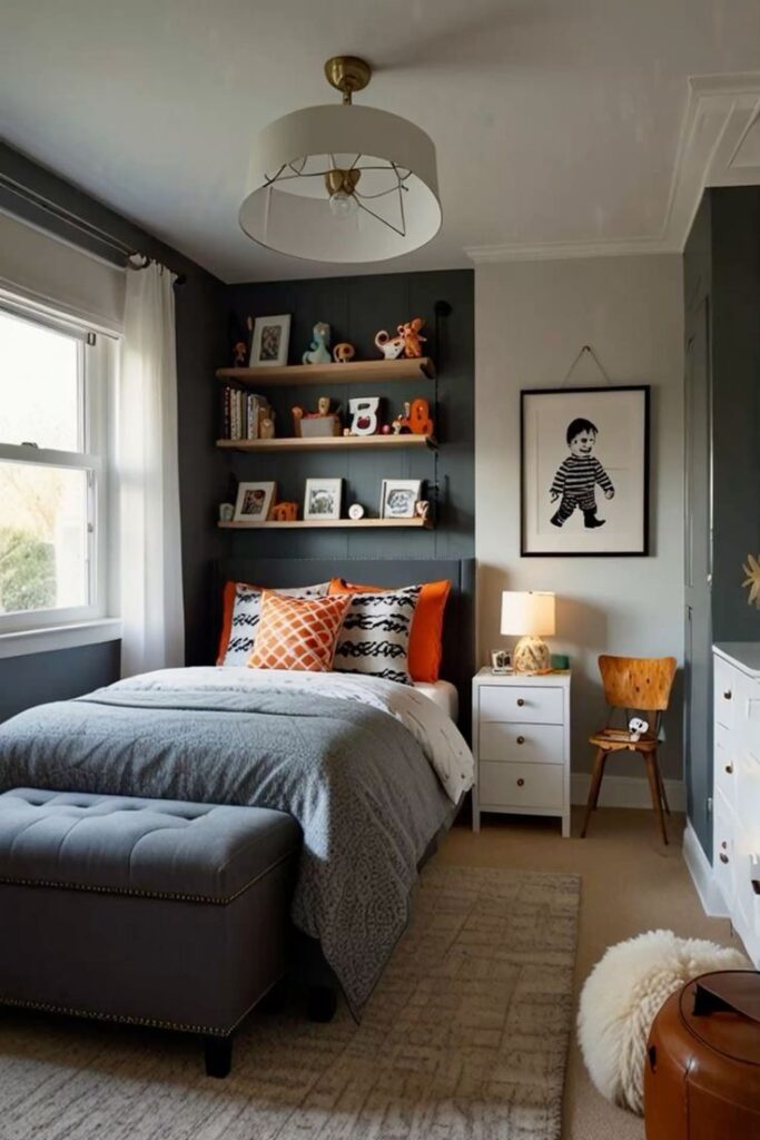 Cozy modern bedroom with grey and orange accents, wall art, shelves, and natural light through a large window.