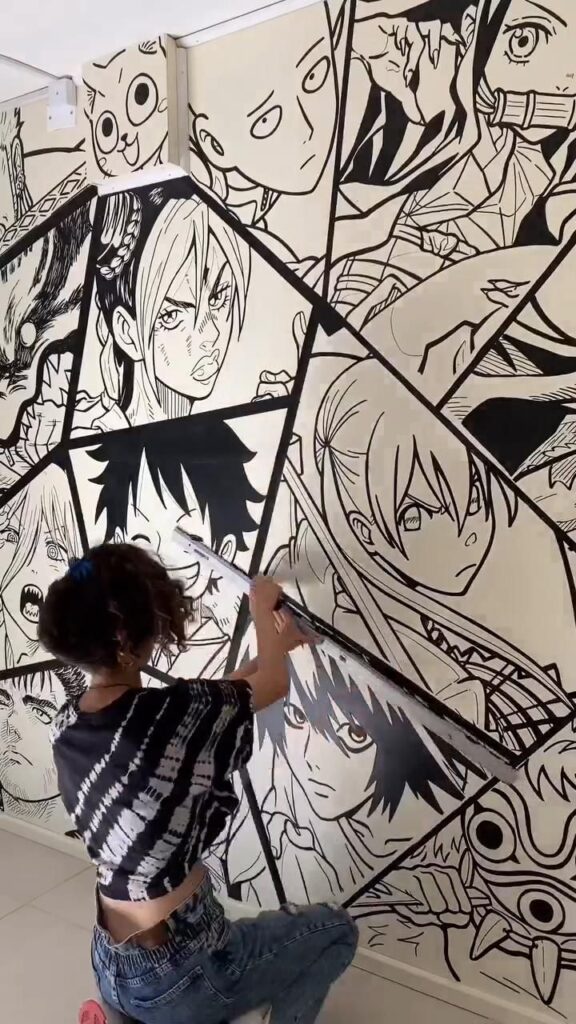 Artist painting anime mural featuring various iconic characters, showcasing dynamic art style and vibrant creativity.