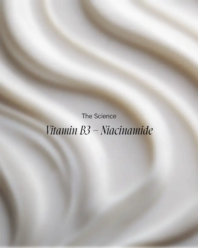 Close-up of creamy texture with Vitamin B3 – Niacinamide text, emphasizing skincare science and benefits.