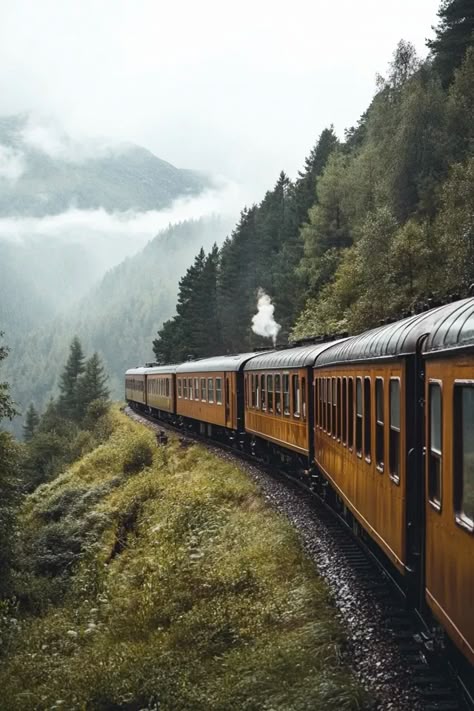Vintage train travels through misty mountains, surrounded by lush green forests. Scenic journey in serene nature.