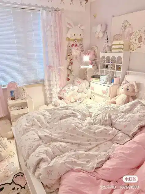 Cozy pastel bedroom with cute plush toys, floral bedding, and soft decor. Perfect feminine space for relaxation and comfort.