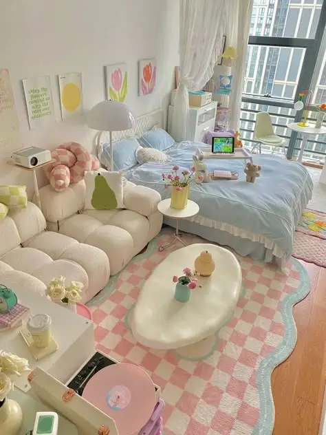Cozy pastel bedroom with stylish decor, plush sofa, and checkered rug. Bright and airy vibe with large windows and colorful accents.
