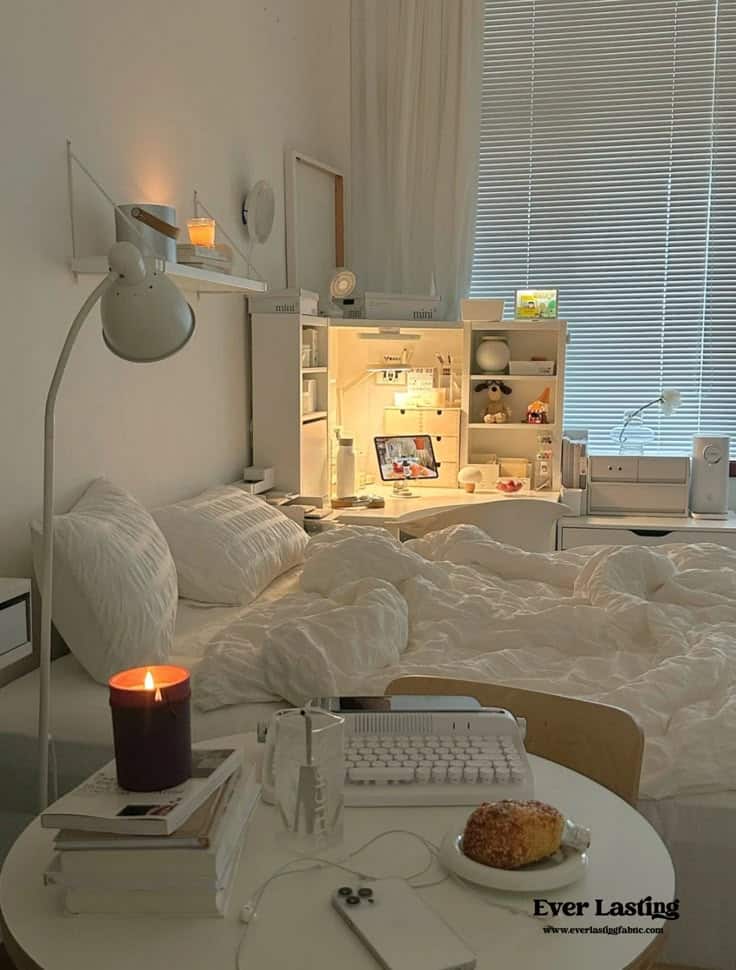 Transform your bedroom into a haven of modern - Handy Home Cozy bedroom with a well-organized workspace, burning candle, and plush bedding, perfect for relaxing or studying.