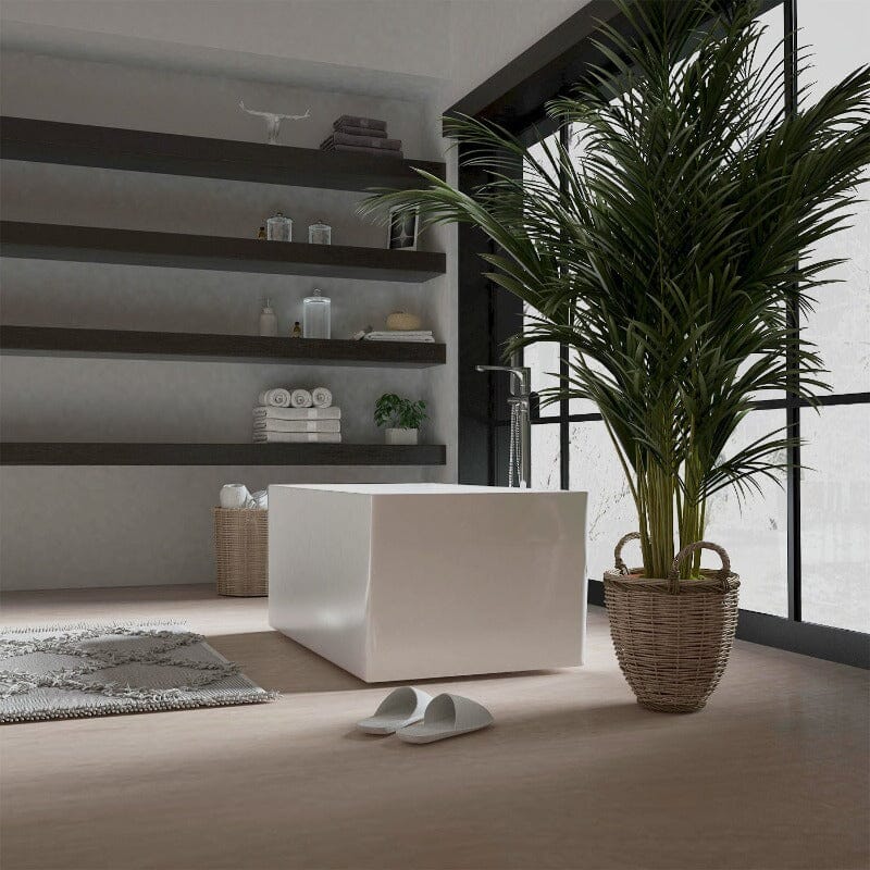 Modern bathroom with a minimalist design, featuring a white bathtub, large plant, open shelving, and natural light.