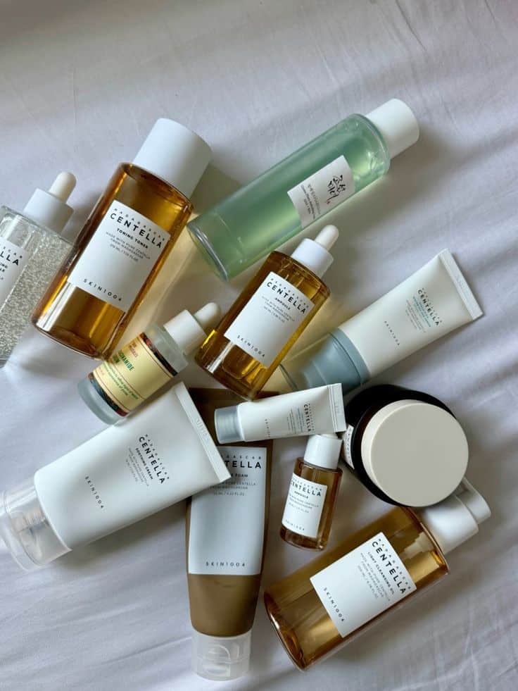 Assorted skincare products including toners and creams on a white background, promoting hydration and skincare routine.