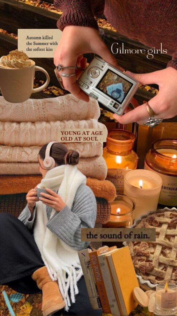 Autumn vibes with cozy sweaters, a warm drink, candles, books, and a digital camera capturing moments. Perfect fall aesthetic.