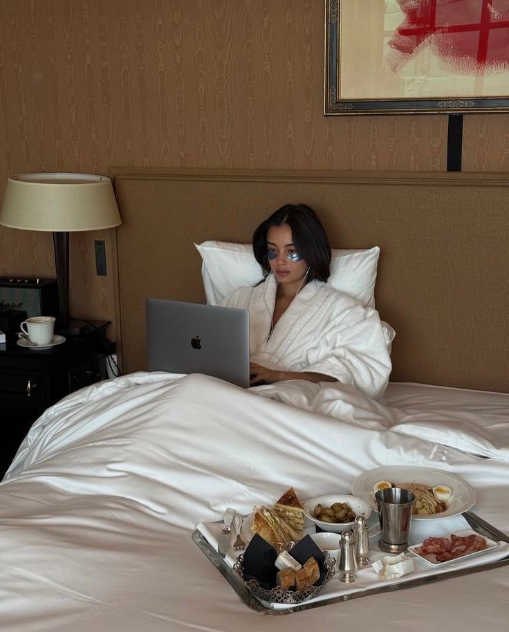 100 Turkish Cotton Bath Robe - Medium Woman in bathrobe using laptop in bed with breakfast tray, hotel room setting, working comfortably, enjoying leisure and luxury. - Handy Home Woman in bathrobe using laptop in bed with breakfast tray, hotel room setting, working comfortably, enjoying leisure and luxury.