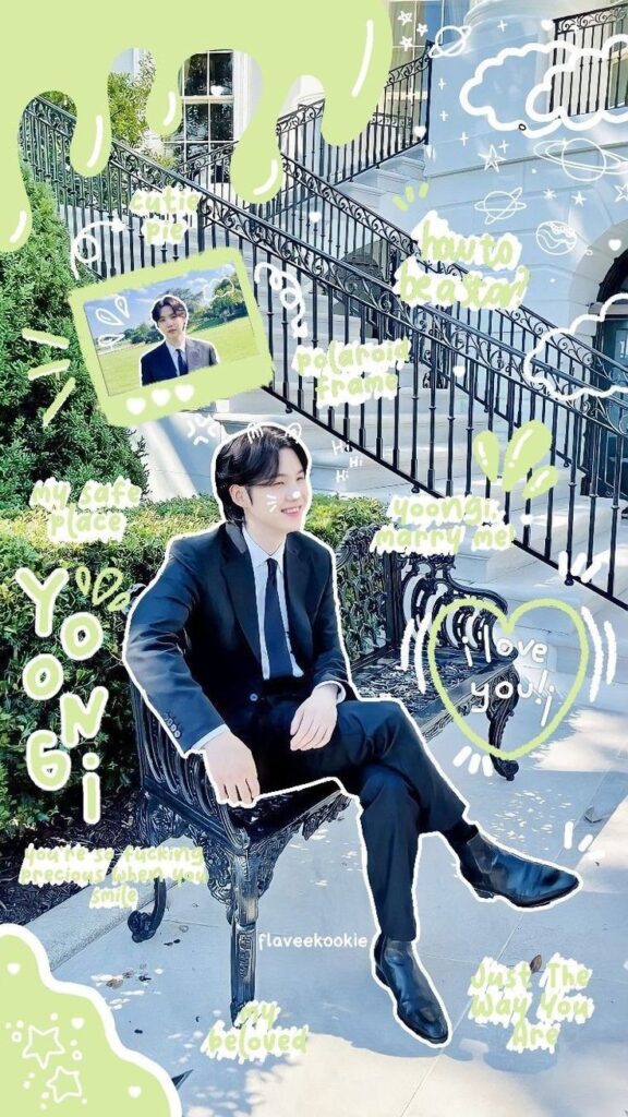 Young man in a suit sitting on a bench, surrounded by playful green and white doodles and text elements.