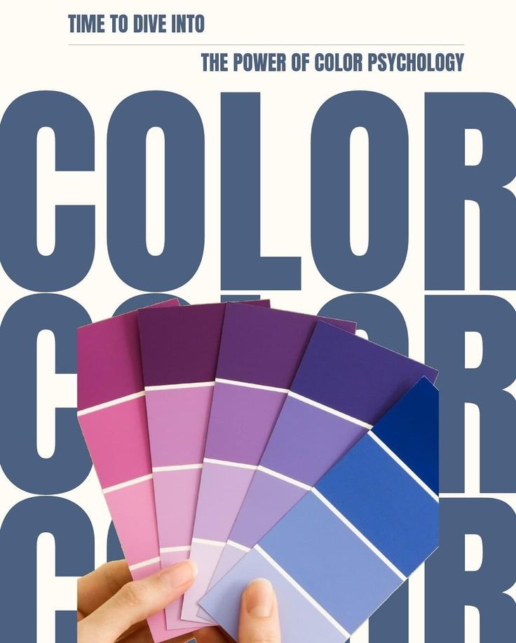 Color psychology concept with a hand holding purple and blue paint swatches, highlighting the impact of hues.