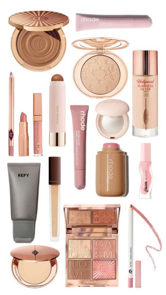 Assorted makeup products including lip glosses, bronzers, highlighters, and palettes, arranged on a white background.