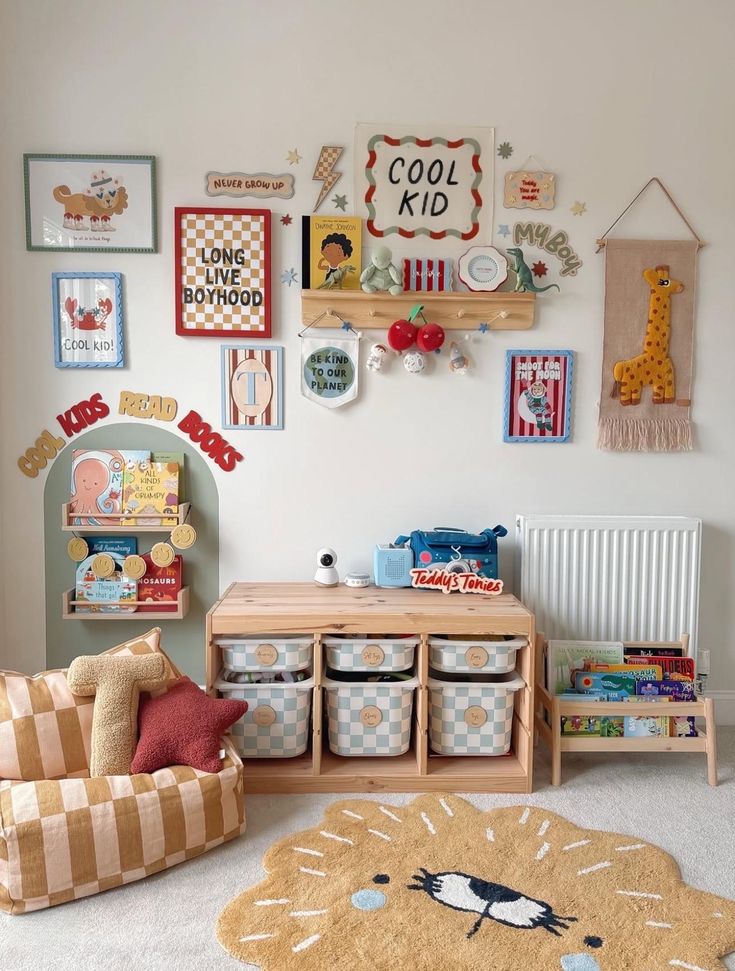 Children's room decor with framed art, a cool kid sign, colorful books, toy storage, pillows, and a lion rug for playful ambiance.
