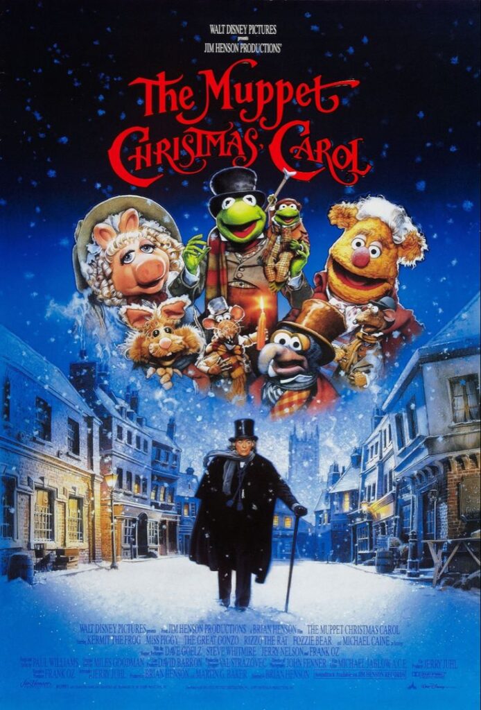 The Muppet Christmas Carol movie poster featuring Muppet characters like Kermit in a snowy Victorian street setting.