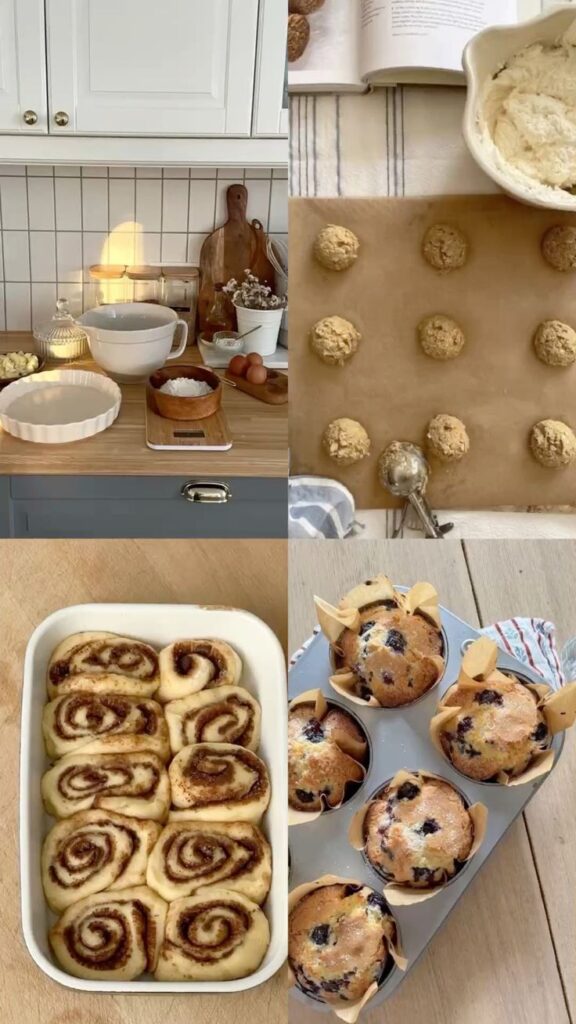 Cozy kitchen baking with ingredients, cookie dough, cinnamon rolls, and fresh blueberry muffins in a warm, inviting setting.