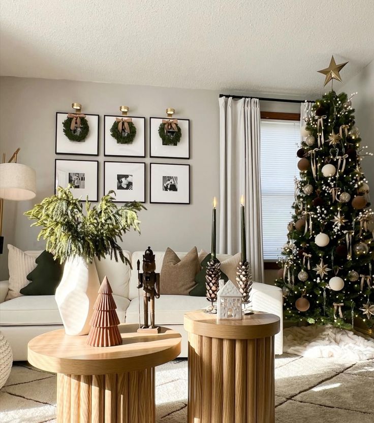 2896808b-e300-470d-ac21-d6e7eb0e6ee1 - Handy Home Cozy living room with Christmas tree, festive decor, and framed photos on the wall. Warm holiday atmosphere.