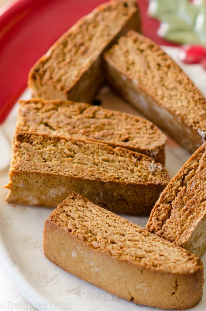 Gingerbread Biscotti - Handy Home Freshly baked gingerbread biscotti slices on a plate, perfect for holiday desserts or coffee pairings.