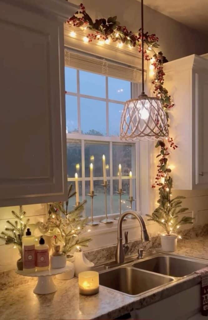 homedesign home design aesthetichome - Handy Home Cozy kitchen window decorated with fairy lights, candles, and festive greenery for a warm holiday ambiance.