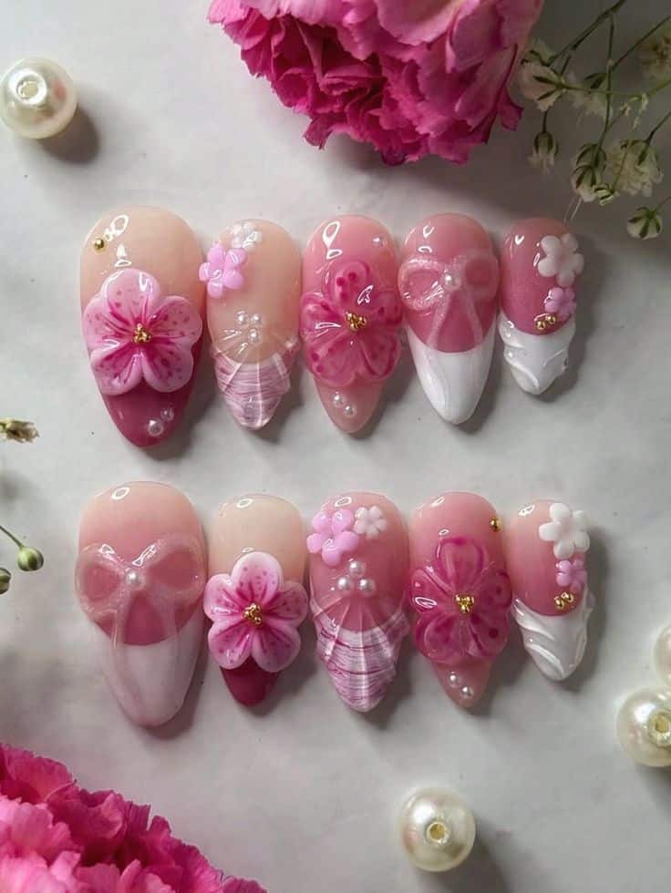 10Pcs Almond Shaped Handmade Nail Tips Ombre Pink - Handy Home Elegant pink floral and pearl 3D nail art design with bows, perfect for a glamorous manicure.