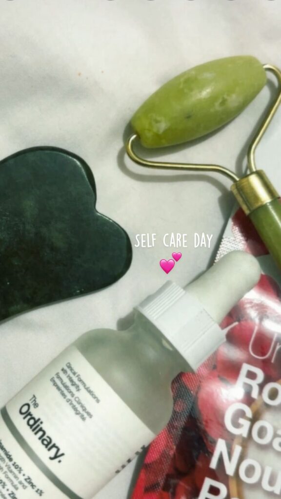 Self care day - Handy Home Self-care essentials: jade roller, serum, gua sha, and facemask on a white background, perfect for relaxing skincare routine.