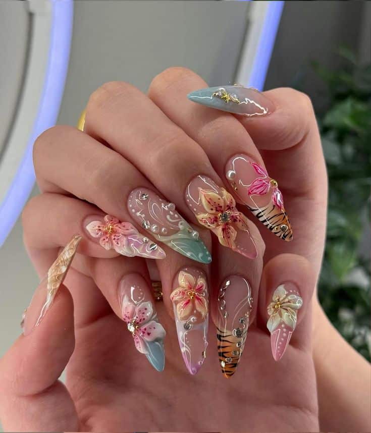 Tropical Glam Nail Art _ Floral Tiger Nail Art _ Y2K Pastel Summer Nails _ Bold Vacation Nails _ Long Stiletto Leopard Nail _ DB427H - Handy Home Intricate floral 3D nail art with colorful designs and rhinestones, highlighting creativity and style in manicure trends.