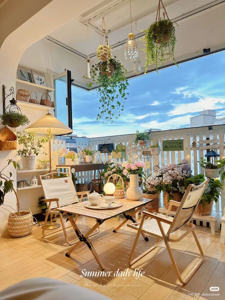 a41b0f31-20e2-4700-aae4-f8ea1837df2b - Handy Home Cozy balcony with plants, wooden furniture, and a soft glow under a blue sky, perfect for relaxing in a summer evening.