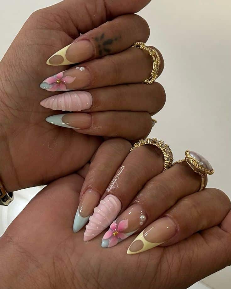 🌺🫧 - inspo vpnailz ✨ nails nailtech - Handy Home Elegant stiletto nail art with pastel tones and floral design, featuring gold rings and pearl accents. Perfect for spring fashion.