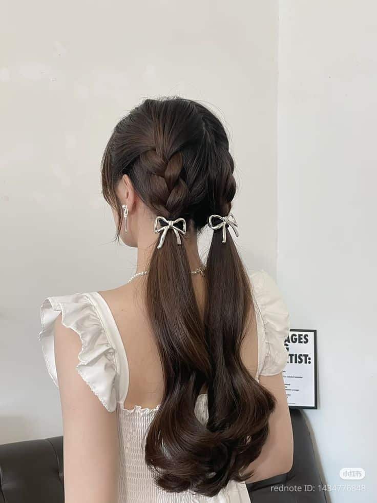 01a93325-8d05-44ae-bdf3-6d7c049ad55f Woman with long, braided hair in pigtails and bows, wearing a white dress with ruffled sleeves, against a plain background. - Handy Home Woman with long, braided hair in pigtails and bows, wearing a white dress with ruffled sleeves, against a plain background.