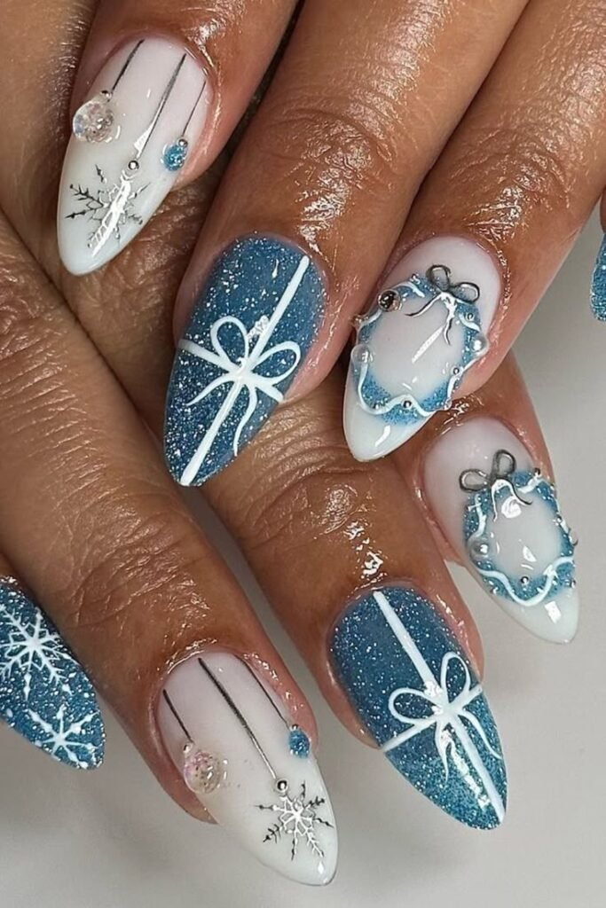 10 Easy DIY Nail Art Ideas You Can Try at Home Snowflake and glitter winter nail art design with blue and white accents, featuring snowflakes, gift bows, and festive decorations. - Handy Home Snowflake and glitter winter nail art design with blue and white accents, featuring snowflakes, gift bows, and festive decorations.