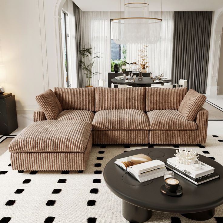 BuotiqHom 118-in W Modern Brown Velvet 3-seater Storage Sectional with Slipcover _ DH-SF3+1-141TA Elegant modern living room with a cozy brown sectional sofa, round coffee table, and chic dining area in the background. - Handy Home Elegant modern living room with a cozy brown sectional sofa, round coffee table, and chic dining area in the background.