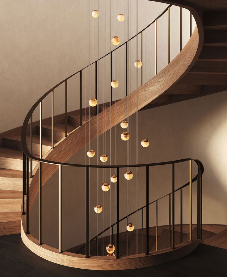 Callisto Multi Light Pendant Elegant spiral staircase with hanging pendant lights in a modern interior, featuring wooden steps and sleek railing. - Handy Home Elegant spiral staircase with hanging pendant lights in a modern interior, featuring wooden steps and sleek railing.