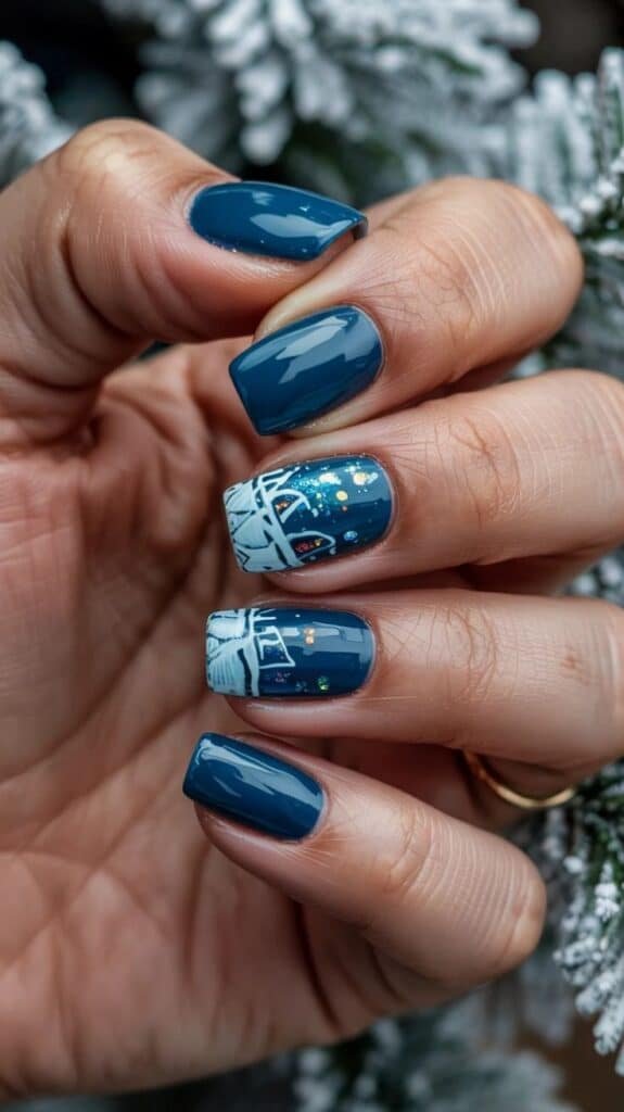 Festive Blue Elegance_ Christmas Nail Art Delight Blue nail art with winter-themed design and sparkle accents, showcasing a festive, stylish manicure. - Handy Home Blue nail art with winter-themed design and sparkle accents, showcasing a festive, stylish manicure.
