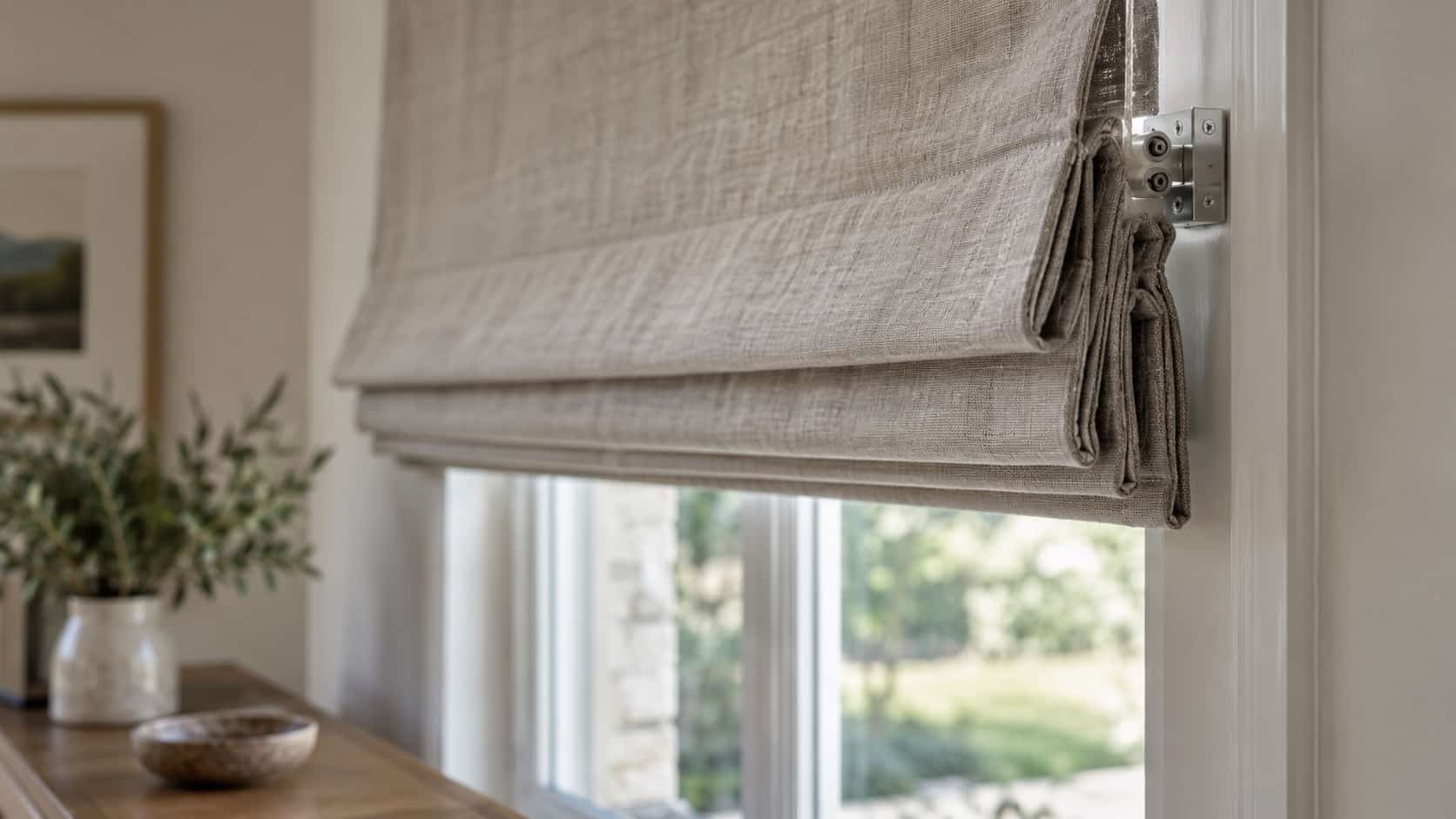 Roman Blind Detail Close-up of stitched folds, lining and neat mounting hardware on a quality Roman blind - Handy Home Close-up of stitched folds, lining and neat mounting hardware on a quality Roman blind